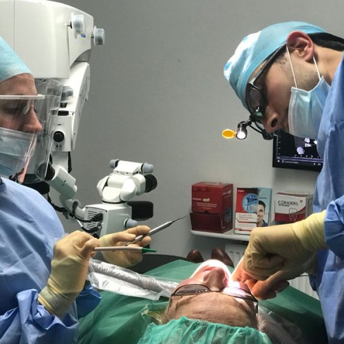dentists and patient in surgery